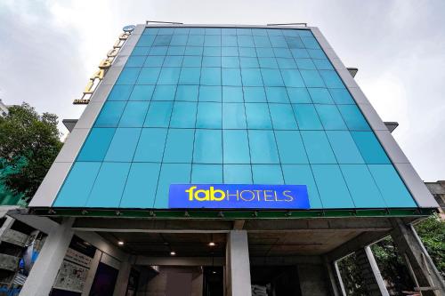 a sign on the front of a building at FabHotel Global Spaces - Nr NESCO Exhibition Center in Mumbai