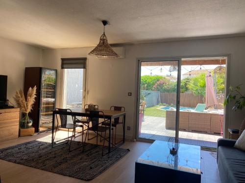 Photo de la galerie de l'établissement Villa Idéal Famille piscine et clim, à Lattes