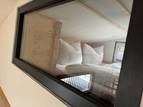 Voodi või voodid majutusasutuse Tiny House Triberg toas
