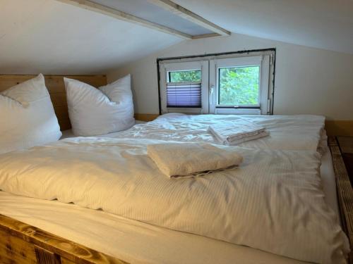 Postel nebo postele na pokoji v ubytování Tiny House Triberg
