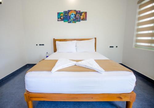 Postel nebo postele na pokoji v ubytování Ocean View Beach Villa Varkala by VOYE HOMES