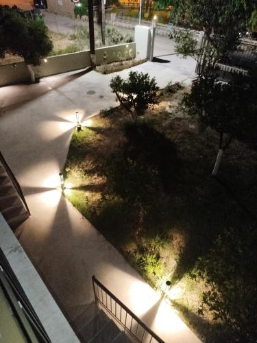 an overhead view of a garden with lights on it at SeaEsta vasiliki 2 in Póndi