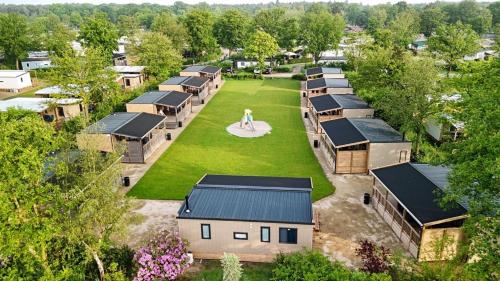 an aerial view of a village with houses at Estivo Premium Mobile homes on Holidaypark TerSpegelt in Eersel