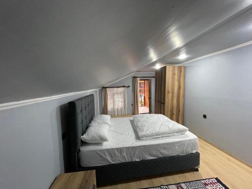 Postel nebo postele na pokoji v ubytování adora apart
