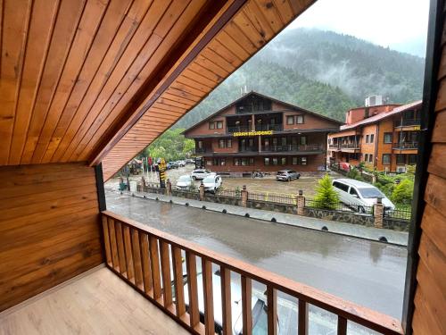 a view of a town from a balcony of a building at adora apart in Uzungol