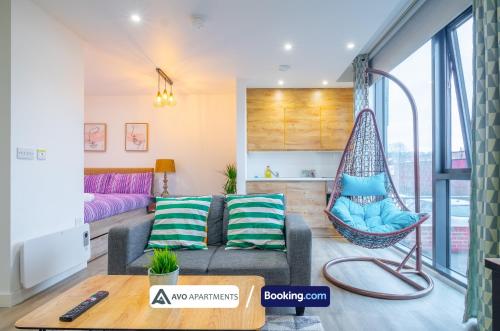 a living room with a couch and a hammock at Prime Serviced Apartments Sheffield Center in Sheffield