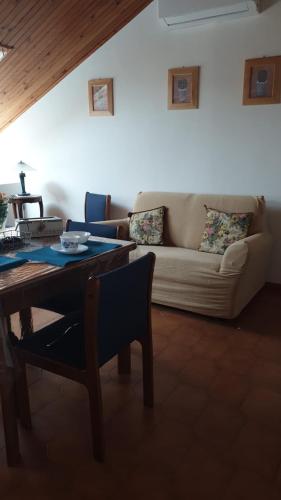 a living room with a couch and a table at Domus Mari in Fiuggi