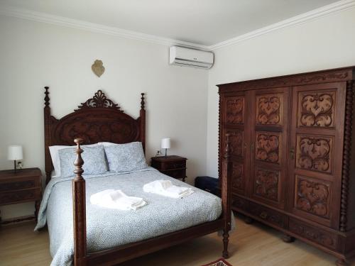 Postel nebo postele na pokoji v ubytování Casinha da Glória