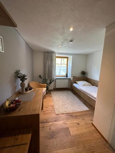 a small room with a bed and a window at Landgasthof Hauser in Immendingen