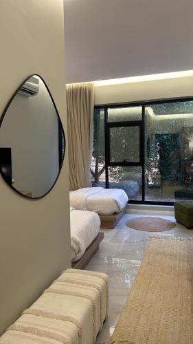Ein Bett oder Betten in einem Zimmer der Unterkunft Damas Resort