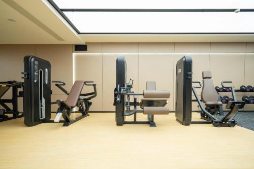 Fitness centrum a/nebo fitness zařízení v ubytování Grand New Century Hotel Binjiang Hangzhou