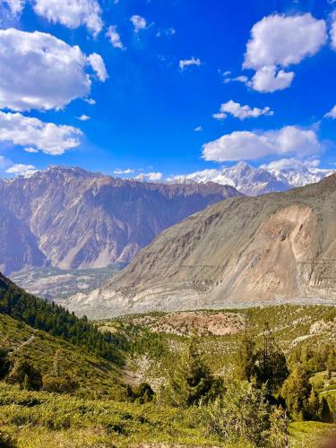 a mountain view of a valley with mountains in the background at Cosy Camping Site Hapakun by Manokur- e- Basa in Minapin