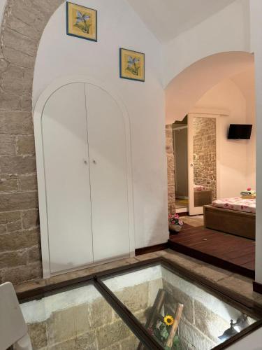 a pool of water in the middle of a room at La Cattedrale in Bisceglie