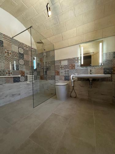 Koupelna v ubytování Il Trullo di Bina