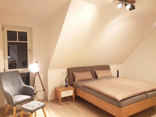 Postel nebo postele na pokoji v ubytování Ferienhaus Treibholz Ostsee mit eigener Sauna