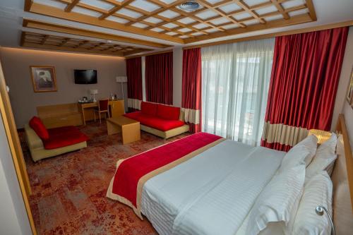 Postel nebo postele na pokoji v ubytování Hotel Colosseo & Spa