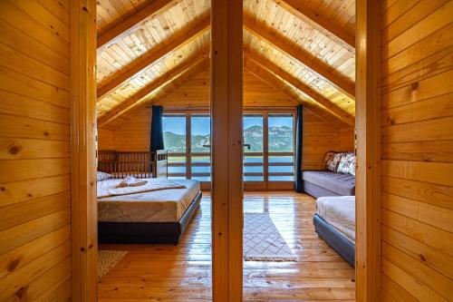 Кровать или кровати в номере Villas Katarina Skadar Lake