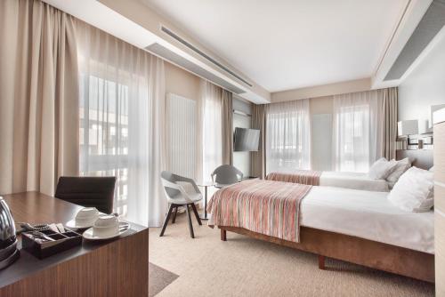 Postel nebo postele na pokoji v ubytování Hotel Arkon Park Gdańsk- Destigo Hotels
