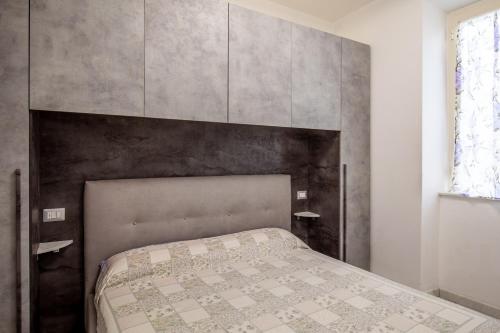 Ένα ή περισσότερα κρεβάτια σε δωμάτιο στο Casa a pochi passi dalla Versilia