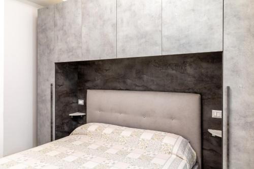 Ένα ή περισσότερα κρεβάτια σε δωμάτιο στο Casa a pochi passi dalla Versilia