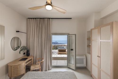 Ένα ή περισσότερα κρεβάτια σε δωμάτιο στο Morfes Luxury Suites by Caldera Houses