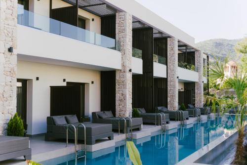 an image of a hotel with a swimming pool at LAN-GO SIVOTA Luxury Living in Sivota