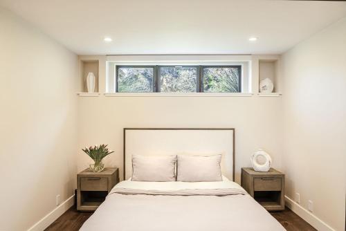 a bedroom with a bed and a window at 3920 Red Tail Hawk home in Carmel