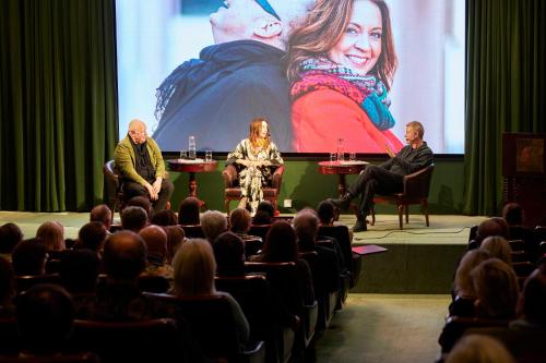 a group of people sitting on a stage in front of a crowd at Grand Hotel Lund in Lund
