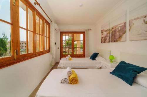 Postel nebo postele na pokoji v ubytování Casa MURTONS by Mallorca Villa Selection