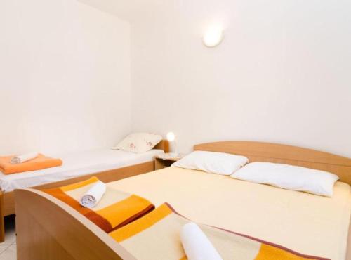 Katil atau katil-katil dalam bilik di Guest House Sobra 38