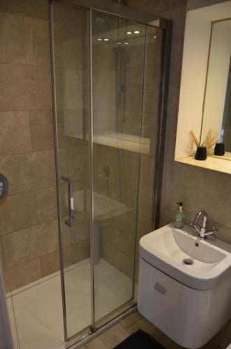Bilik mandi di Cosy Apartment Central Bath