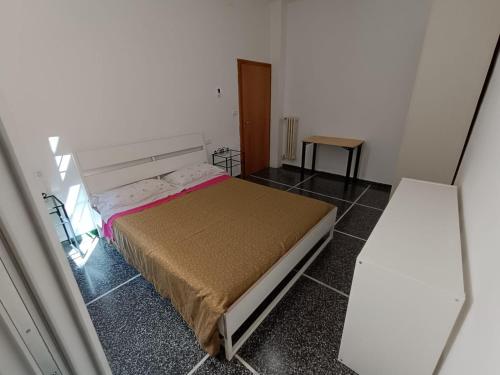 Een bed of bedden in een kamer bij Saragozza Guest House
