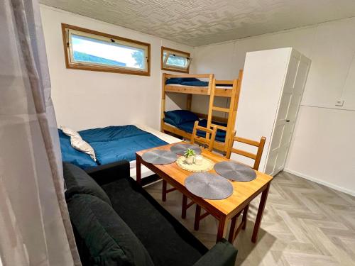 Postel nebo postele na pokoji v ubytování Chatky na Rozkoši - Tina