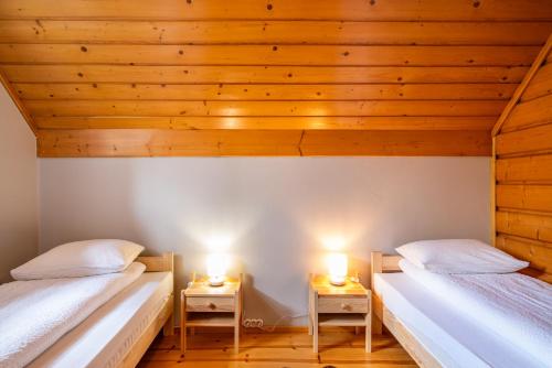 Ένα ή περισσότερα κρεβάτια σε δωμάτιο στο Apartament na Skalistej Dolinie