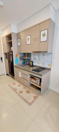 a kitchen with a sink and a counter top at The Song Luxury Condotel Vung Tau - Căn hộ cao cấp Luca's House in Vung Tau