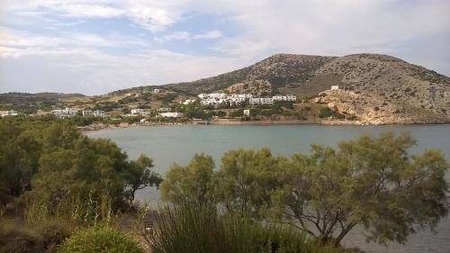 a view of a lake with houses on a mountain at Peter & Tony Rooms in Galissas