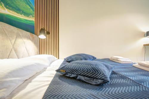 Letto o letti in una camera di HelApart - Casa Baia
