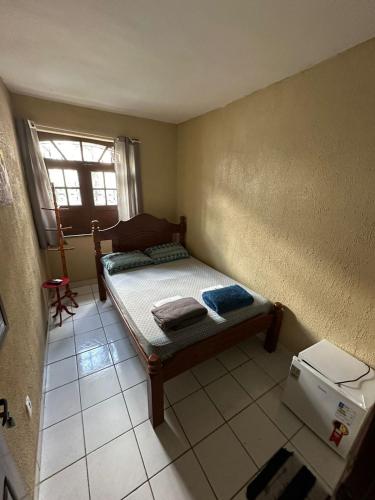 Una cama o camas en una habitación de RioSlz Hostel