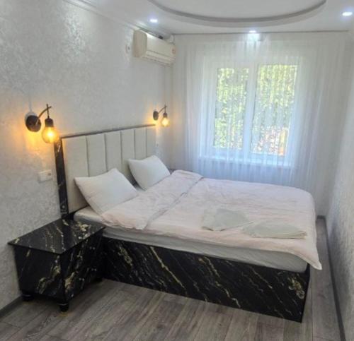 Llit o llits en una habitació de Тихий уголок