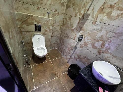 Koupelna v ubytování Hotel AJL