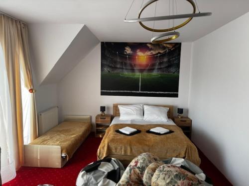 Katil atau katil-katil dalam bilik di BUTIK Hotel 350m od plaży
