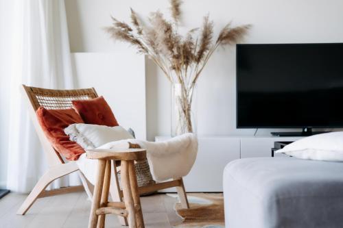 TV a/nebo společenská místnost v ubytování Residentie Strandhotel - Apartments with hotel service and wellness