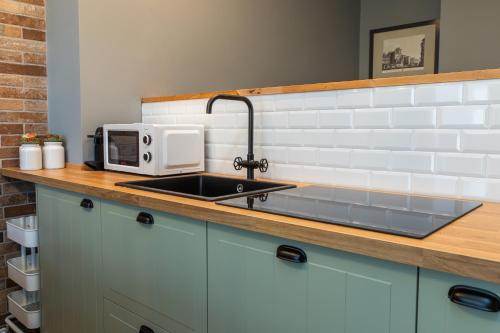 Kuchyň nebo kuchyňský kout v ubytování New Design Studio - Prada & Duomo a pochi minuti