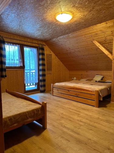 Postel nebo postele na pokoji v ubytování Chalupa Blažkova