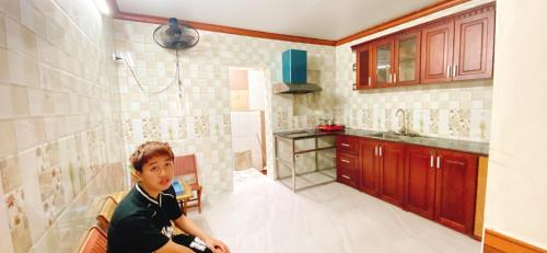 Η κουζίνα ή μικρή κουζίνα στο Cuccu homestay 5
