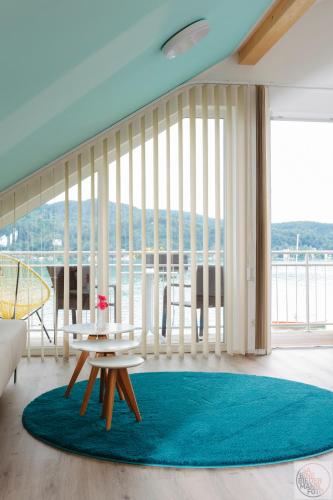 Un balcón o terraza de Appartements am See