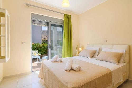 Postel nebo postele na pokoji v ubytování Villa Rodos Aphrodite by Villa Plus