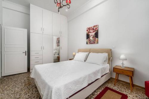 Postel nebo postele na pokoji v ubytování Aphrodites Place