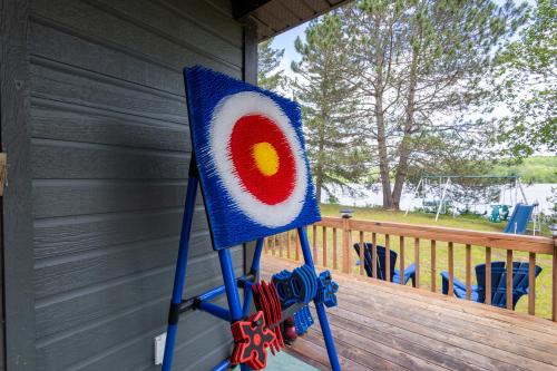 a target on the side of a porch at Lake House Chalet Laurentians in Nominingue
