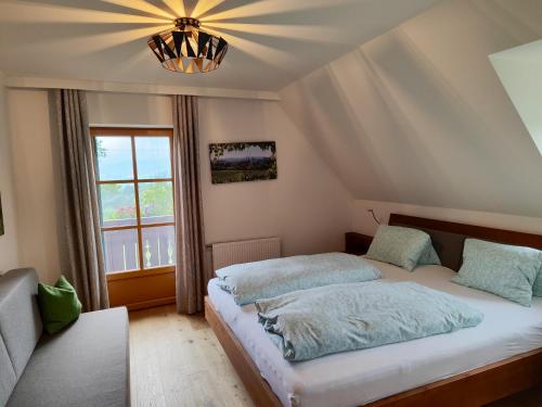 Postel nebo postele na pokoji v ubytování Weingut Fellner